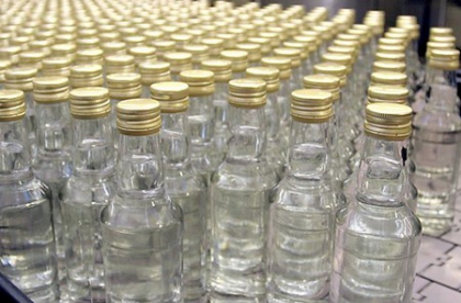 Азаров повысил малые цены на водку