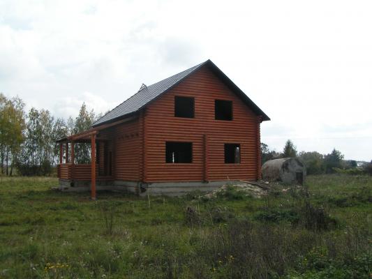Дом из оцилиндрованного бревна